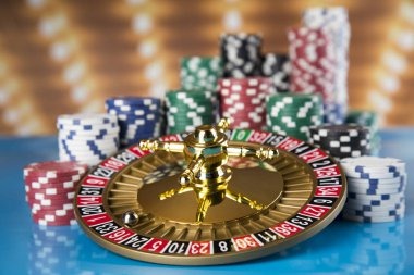 Evolution Gaming roulette wheel interface on kingdomtoto group mobile showing betting layout